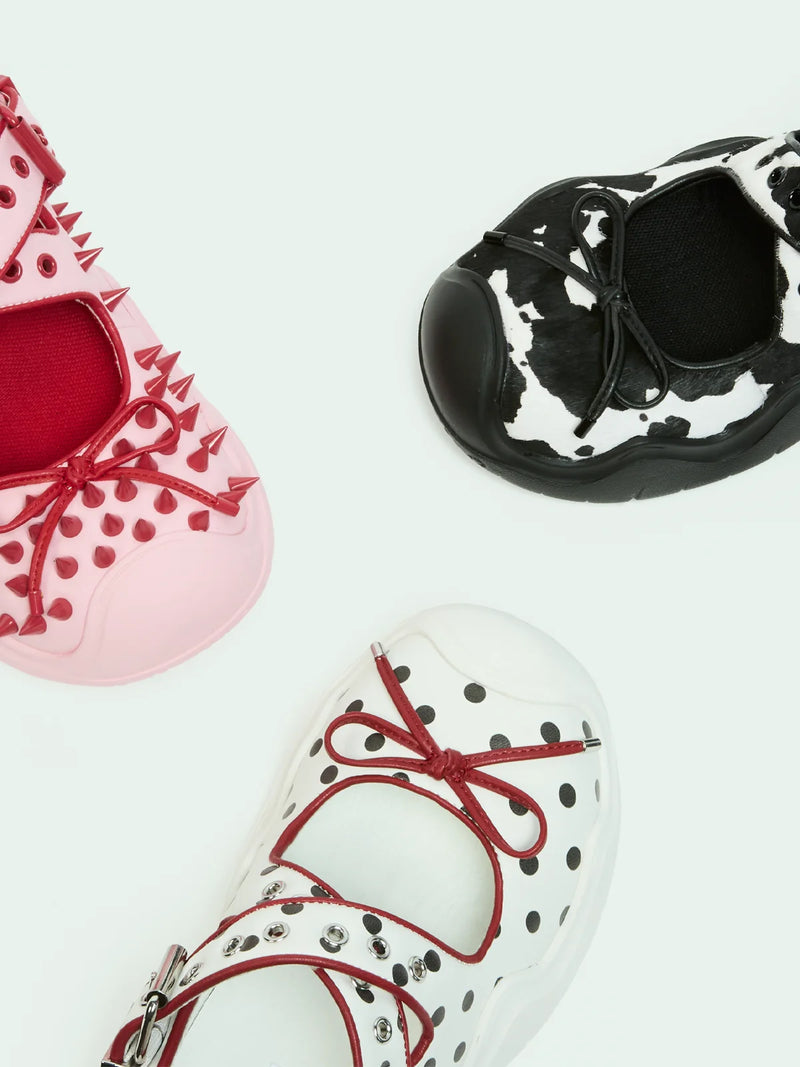 ANYA COW PRINT PONY