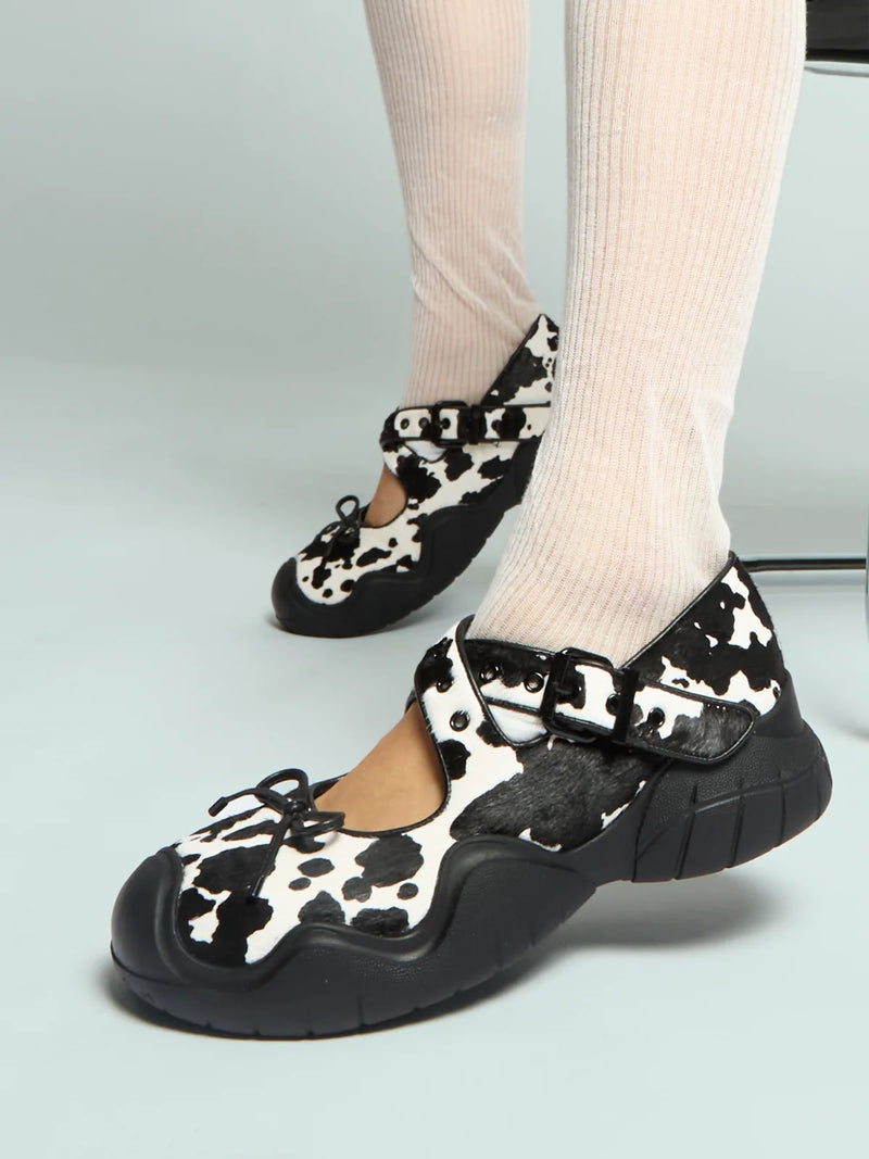 ANYA COW PRINT PONY