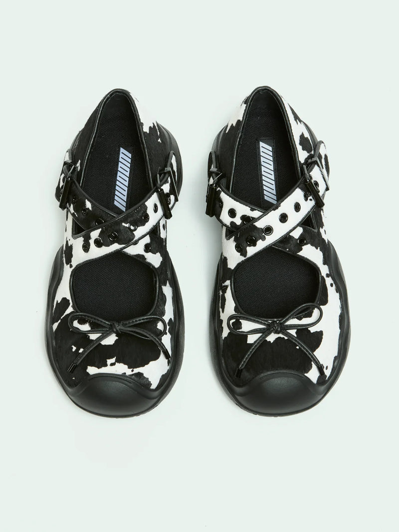 ANYA COW PRINT PONY