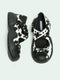 ANYA COW PRINT PONY