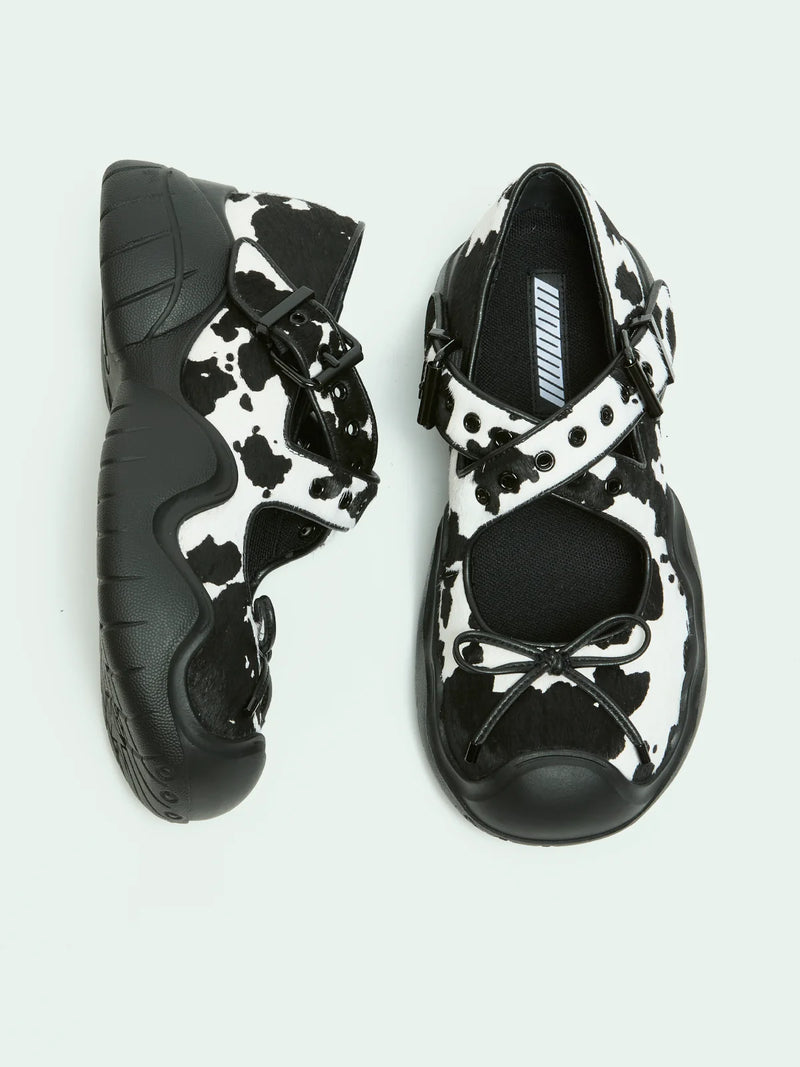 ANYA COW PRINT PONY