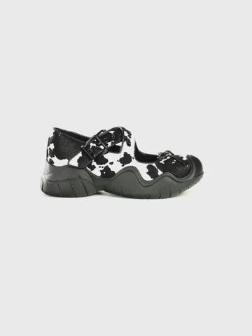 ANYA COW PRINT PONY